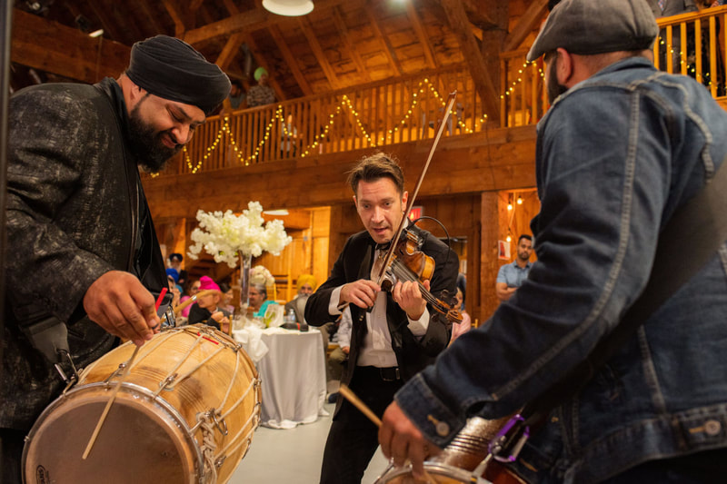 wedding performance at sikh wedding in Country Heritage Park Gambrel Barn